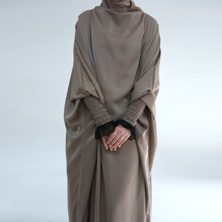 Get trendy with Marwa Satin Jilbab - Ash - Dresses available at Voilee NY. Grab yours for $44.99 today!