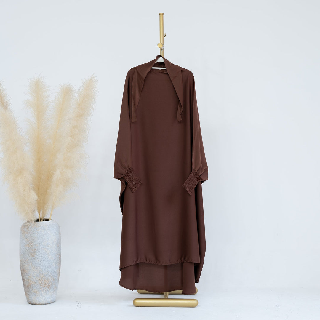 Get trendy with Marwa Kids Satin Jilbab - Coffee - Dresses available at Voilee NY. Grab yours for $39.90 today!