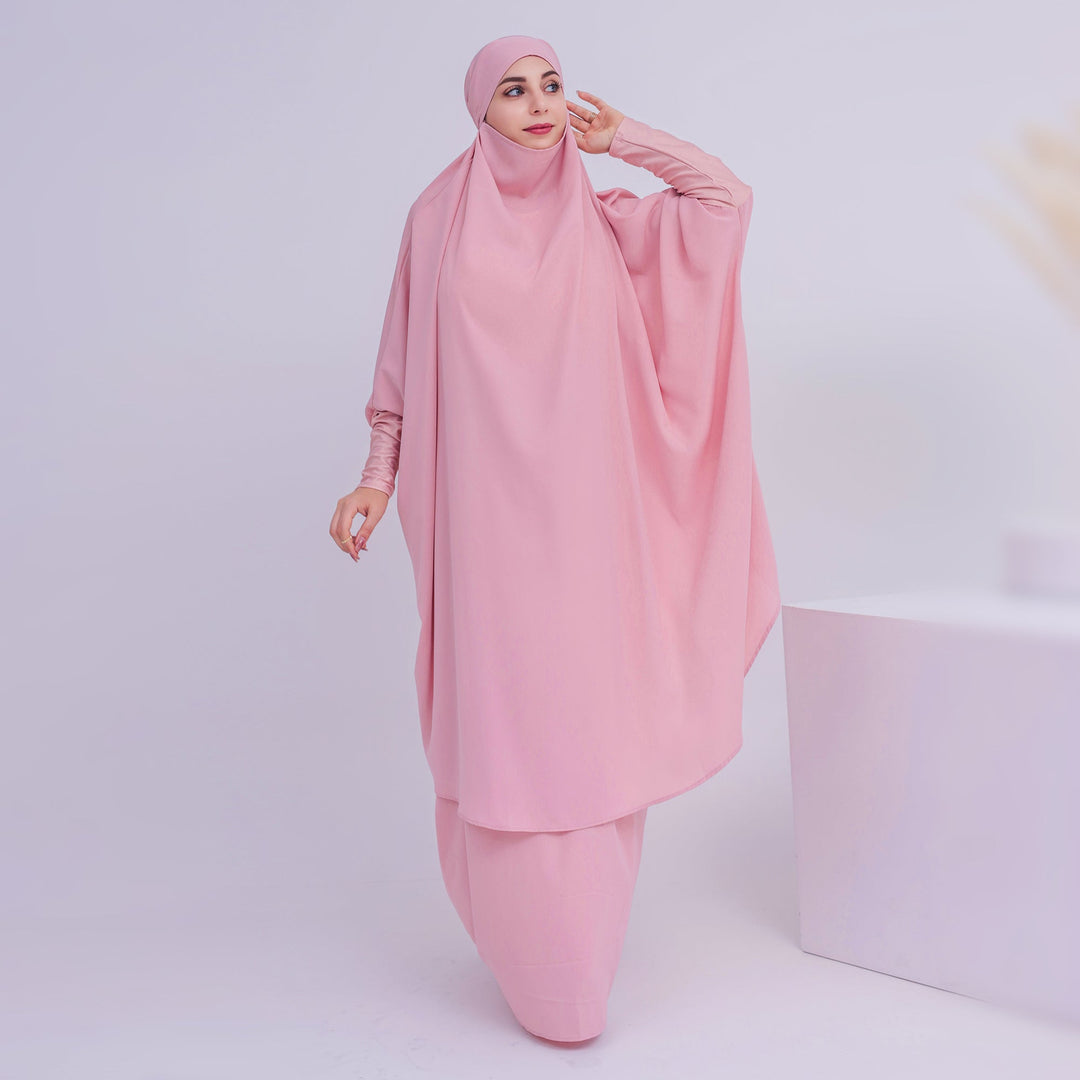 Get trendy with 2-piece Amira Jilbab - pink - Skirts available at Voilee NY. Grab yours for $74.90 today!