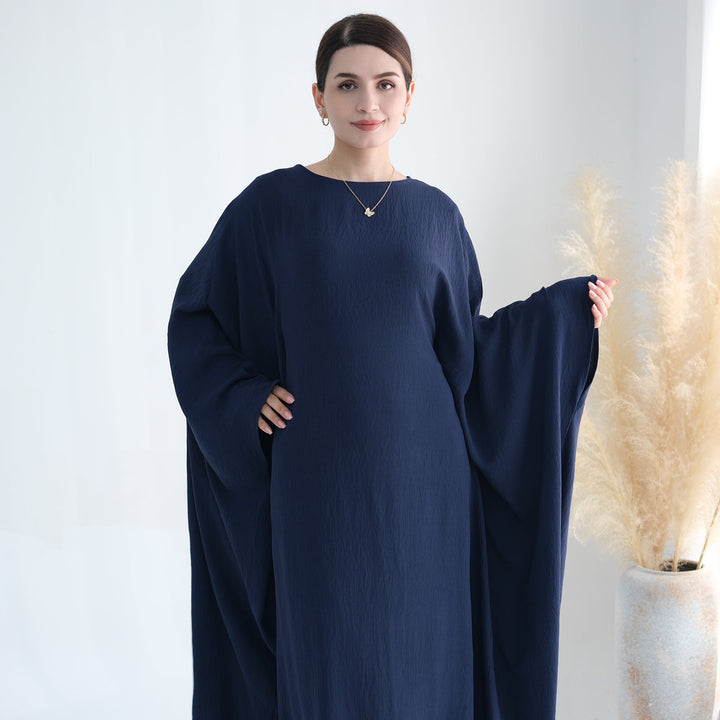 Get trendy with Naimah Textured Butterfly Abaya - Navy -  available at Voilee NY. Grab yours for $54.90 today!