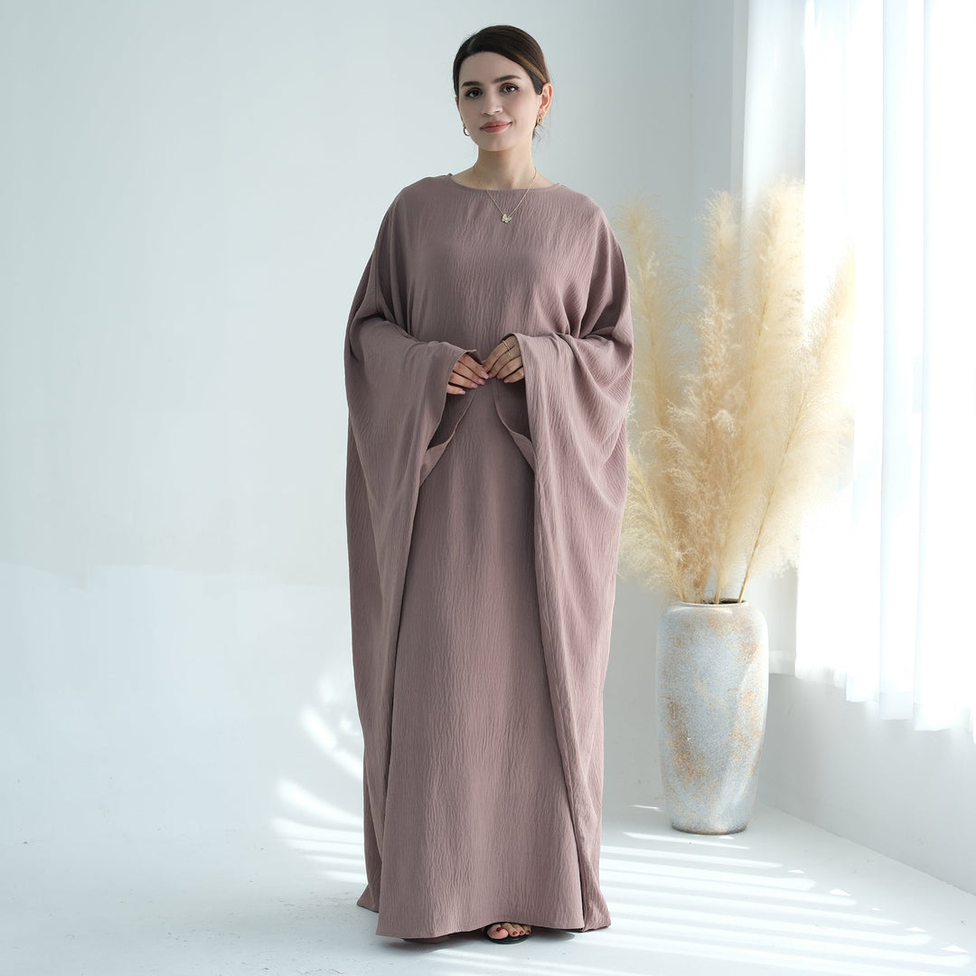 Get trendy with Naimah Textured Butterfly Abaya - Taupe -  available at Voilee NY. Grab yours for $54.90 today!