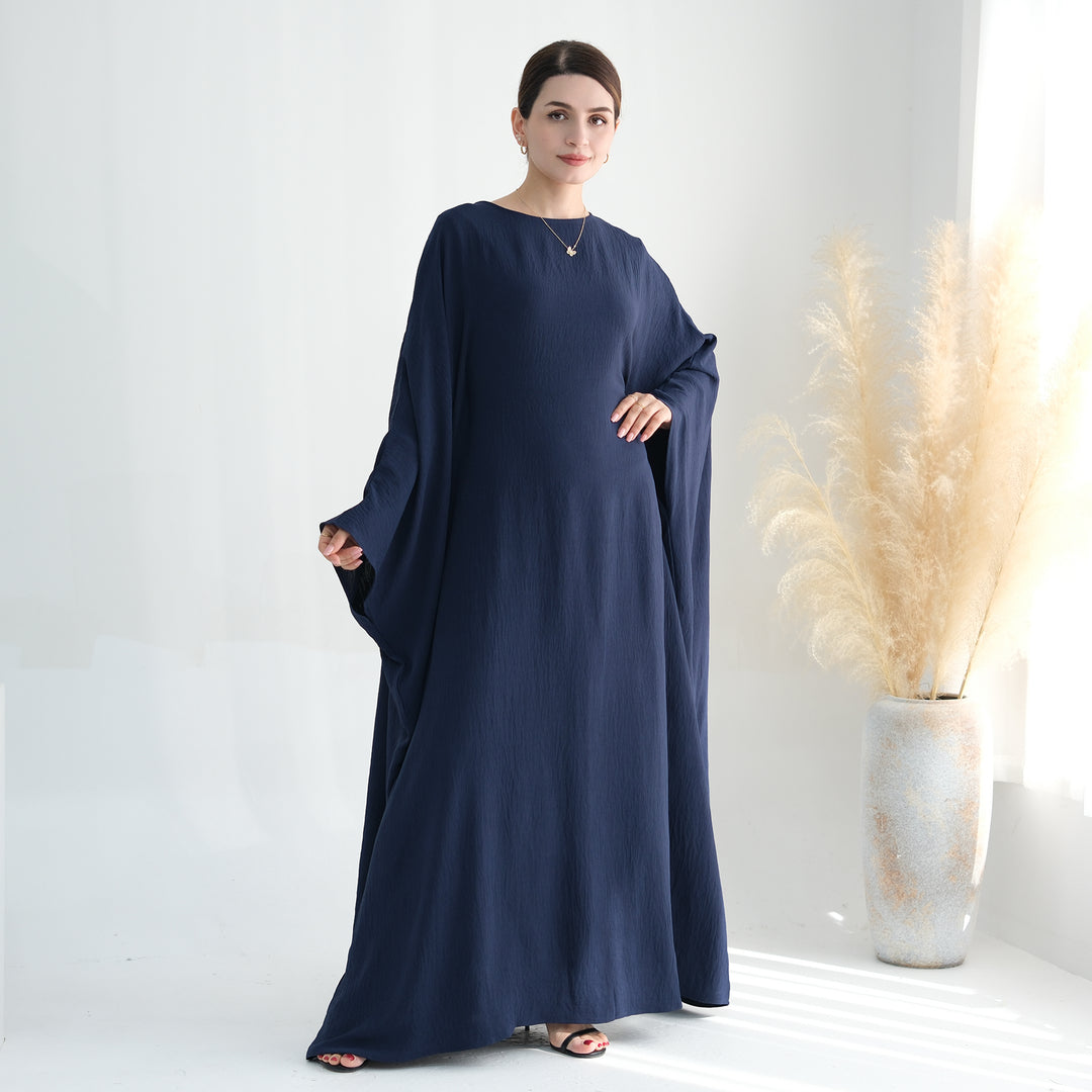Get trendy with Naimah Textured Butterfly Abaya - Navy -  available at Voilee NY. Grab yours for $54.90 today!