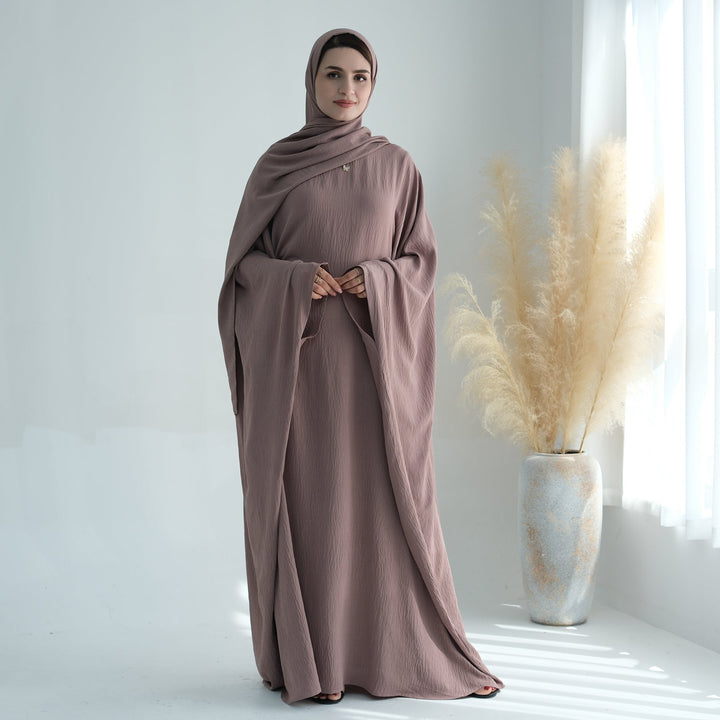 Get trendy with Naimah Textured Butterfly Abaya - Taupe -  available at Voilee NY. Grab yours for $54.90 today!