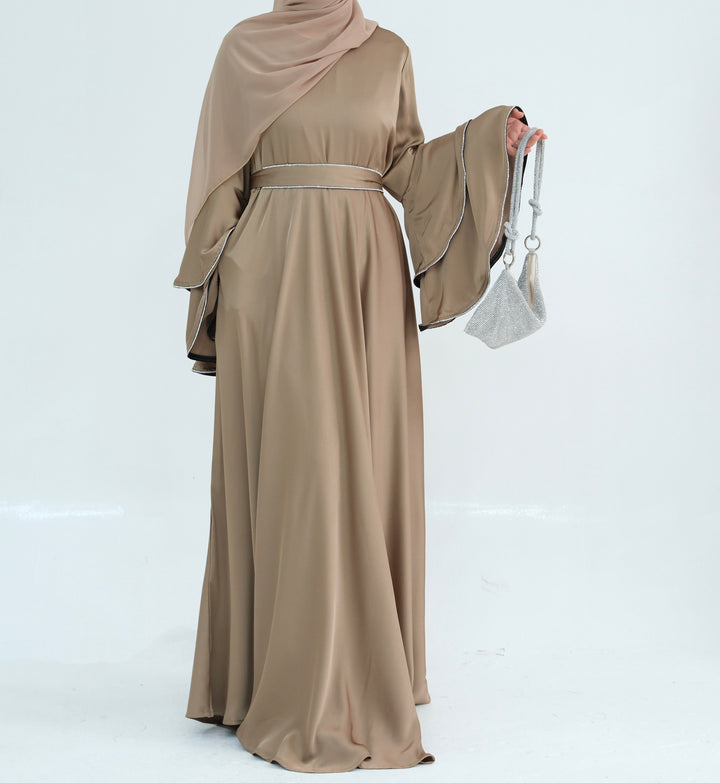 Get trendy with Naomi Satin Bell Sleeves Maxi Dress - Beige - Dresses available at Voilee NY. Grab yours for $67.90 today!