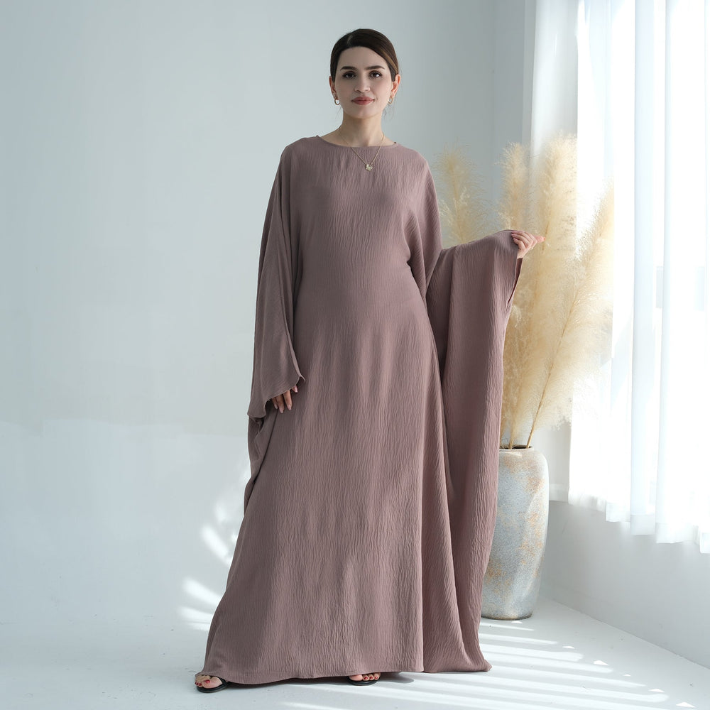 Get trendy with Naimah Textured Butterfly Abaya - Taupe -  available at Voilee NY. Grab yours for $54.90 today!