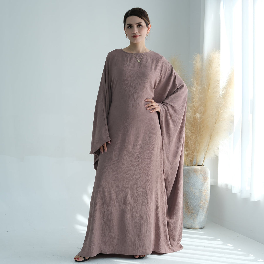 Get trendy with Naimah Textured Butterfly Abaya - Taupe -  available at Voilee NY. Grab yours for $54.90 today!