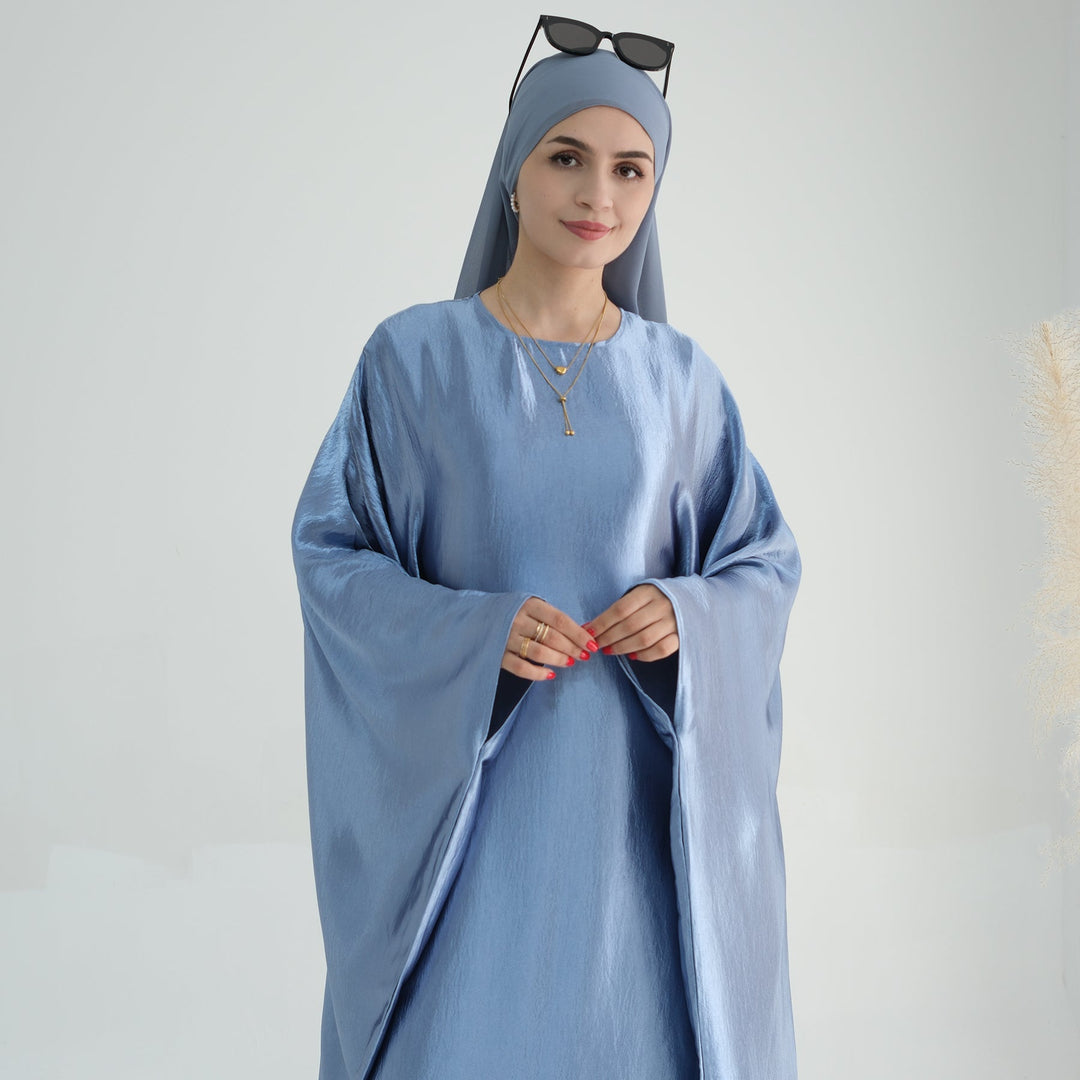 Get trendy with Alisha Butterfly Satin Abaya - Blue - Dresses available at Voilee NY. Grab yours for $72.90 today!