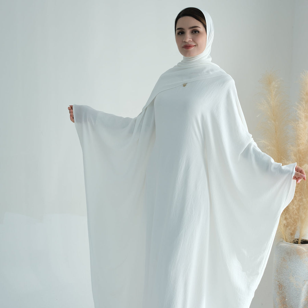 Get trendy with Naimah Textured Butterfly Abaya - White -  available at Voilee NY. Grab yours for $54.90 today!