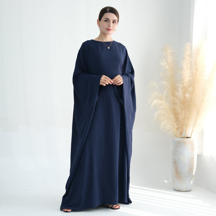 Get trendy with Naimah Textured Butterfly Abaya - Navy -  available at Voilee NY. Grab yours for $54.90 today!