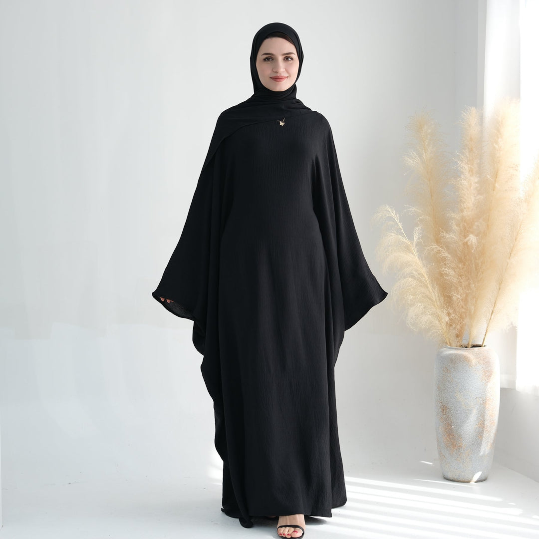 Get trendy with Naimah Textured Butterfly Abaya - Black -  available at Voilee NY. Grab yours for $54.90 today!