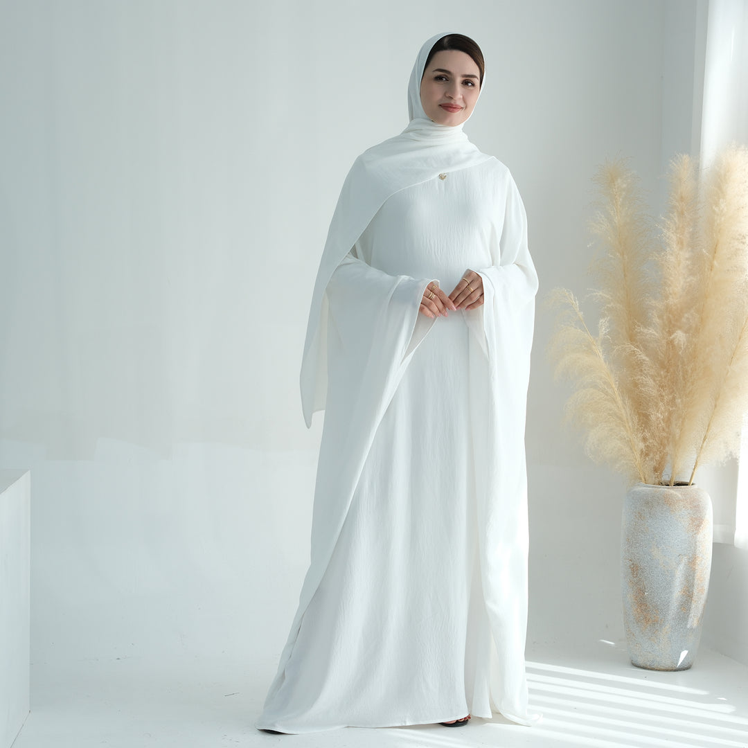 Get trendy with Naimah Textured Butterfly Abaya - White -  available at Voilee NY. Grab yours for $54.90 today!