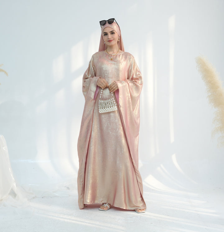 Get trendy with Linora Shimmer Butterfly Abaya - Peach - Dresses available at Voilee NY. Grab yours for $59.90 today!