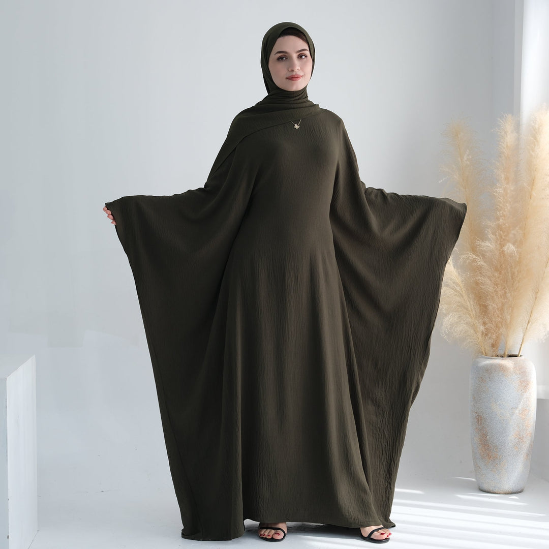 Get trendy with Naimah Textured Butterfly Abaya - Olive -  available at Voilee NY. Grab yours for $54.90 today!