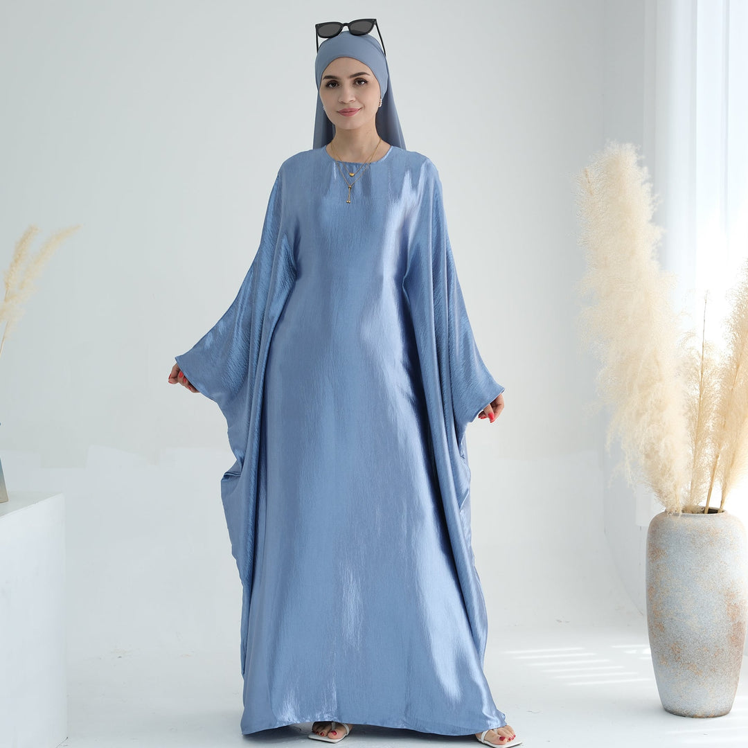 Get trendy with Alisha Butterfly Satin Abaya - Blue - Dresses available at Voilee NY. Grab yours for $72.90 today!