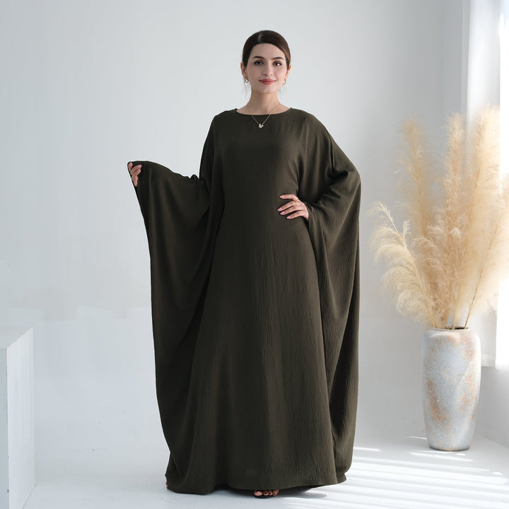 Get trendy with Naimah Textured Butterfly Abaya - Olive -  available at Voilee NY. Grab yours for $54.90 today!