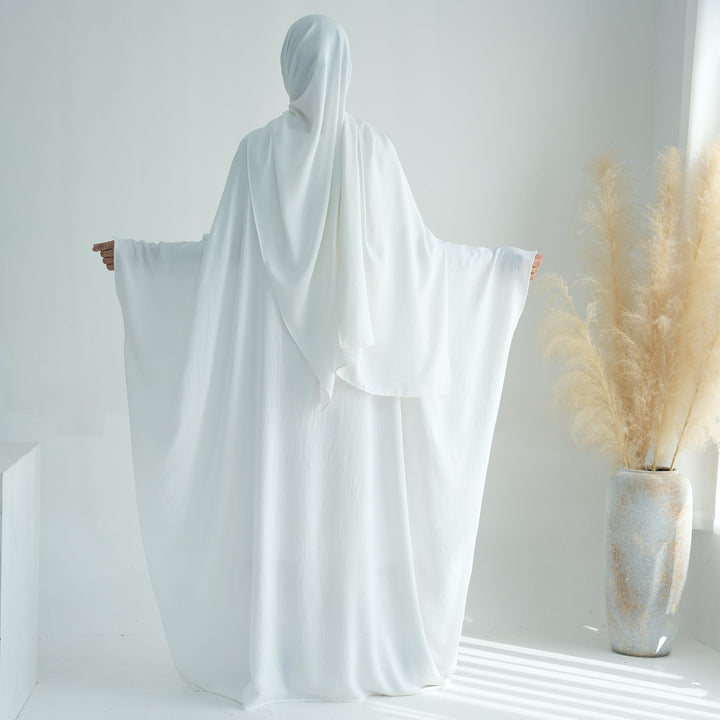 Get trendy with Naimah Textured Butterfly Abaya - White -  available at Voilee NY. Grab yours for $54.90 today!