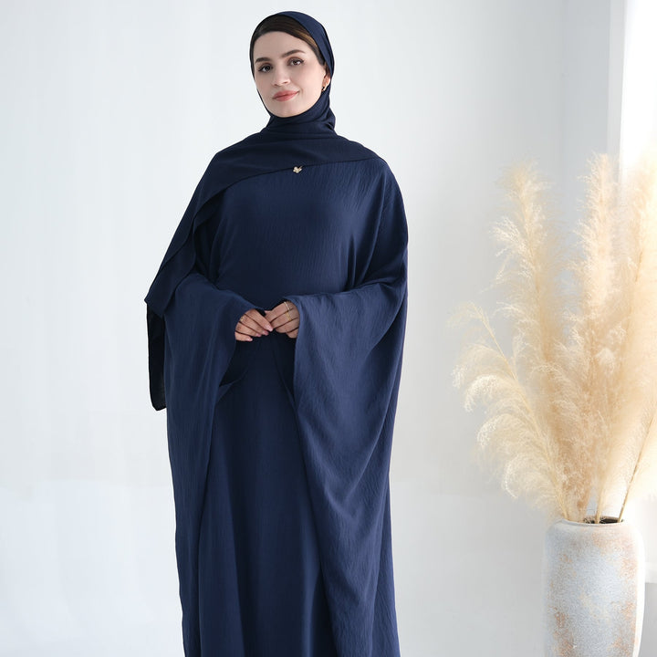 Get trendy with Naimah Textured Butterfly Abaya - Navy -  available at Voilee NY. Grab yours for $54.90 today!