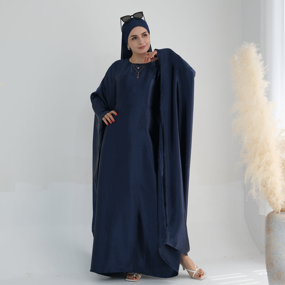 Get trendy with Alisha Butterfly Satin Abaya - Navy - Dresses available at Voilee NY. Grab yours for $72.90 today!