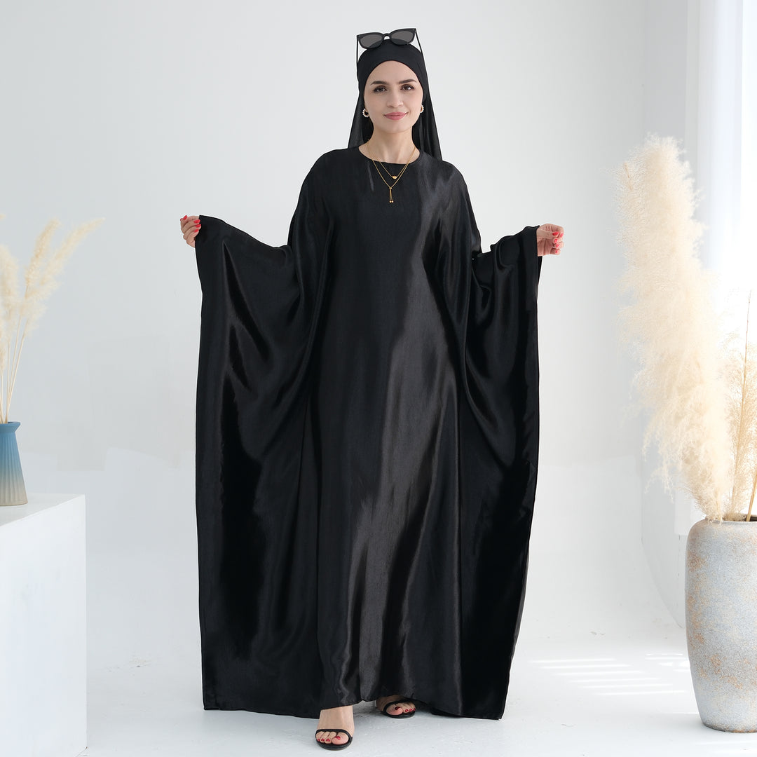 Get trendy with Alisha Butterfly Satin Abaya - Black - Dresses available at Voilee NY. Grab yours for $72.90 today!