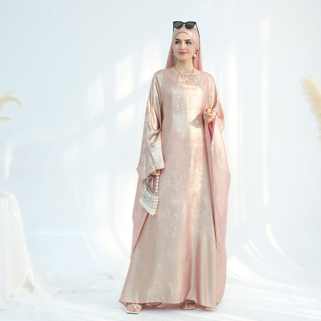 Get trendy with Linora Shimmer Butterfly Abaya - Peach - Dresses available at Voilee NY. Grab yours for $59.90 today!