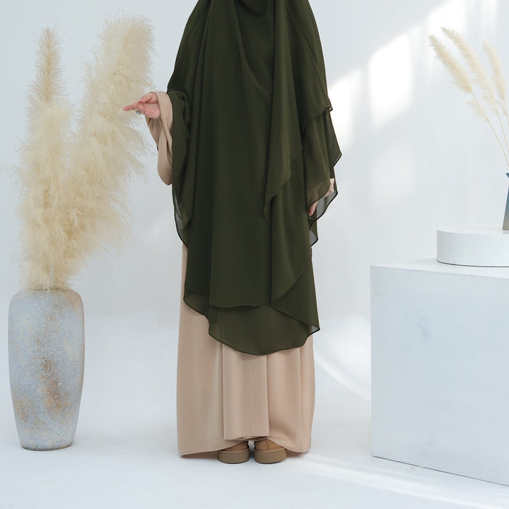 Get trendy with 2-layer Maxi Chiffon Khimar - Olive -  available at Voilee NY. Grab yours for $44.90 today!