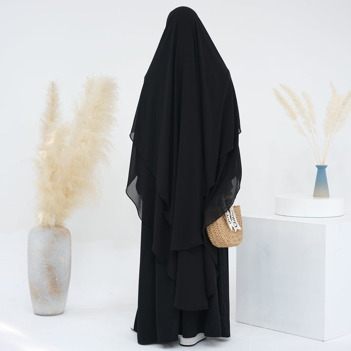 Get trendy with 2-layer Maxi Chiffon Khimar - Black -  available at Voilee NY. Grab yours for $44.90 today!