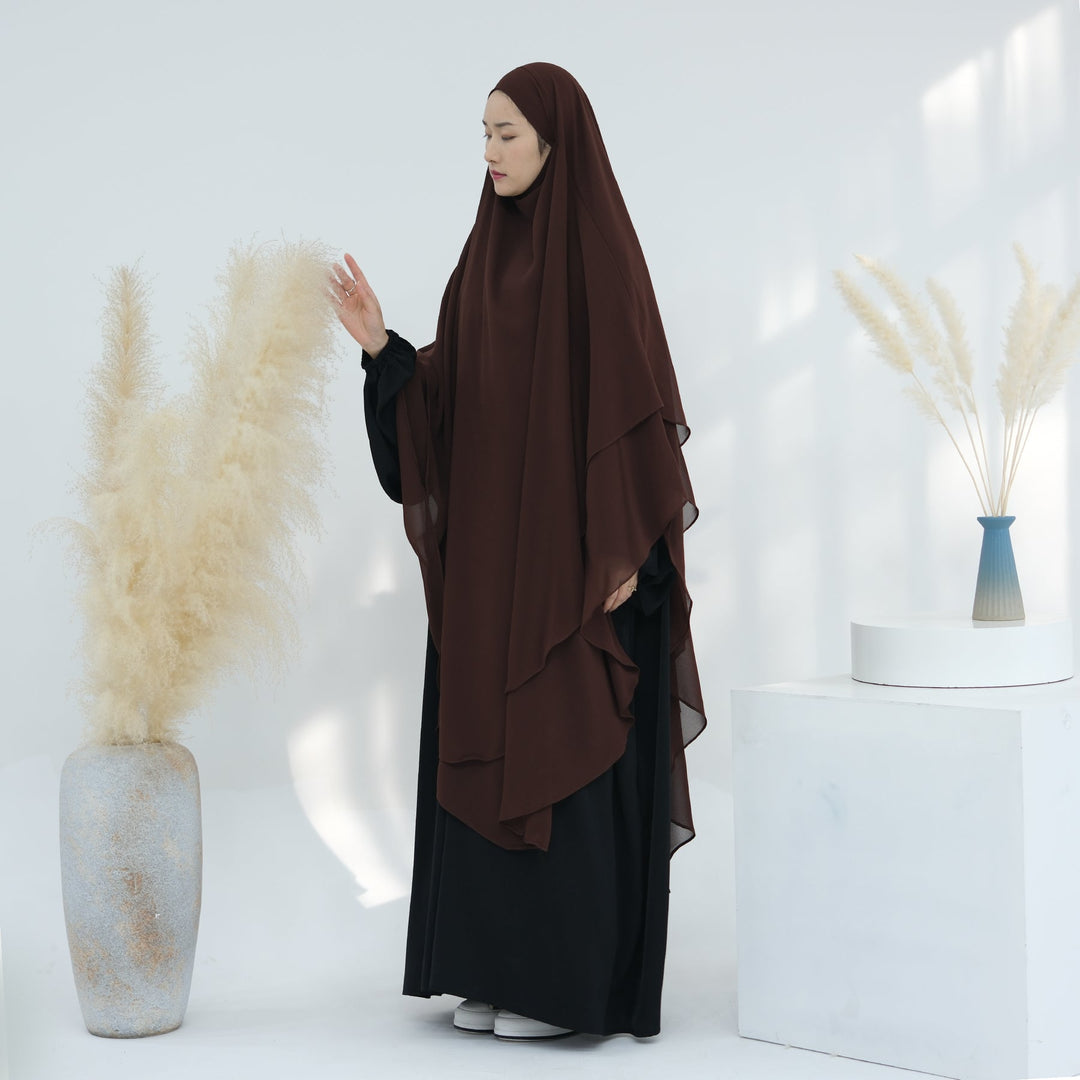 Get trendy with 2-layer Maxi Chiffon Khimar - Coffee -  available at Voilee NY. Grab yours for $44.90 today!