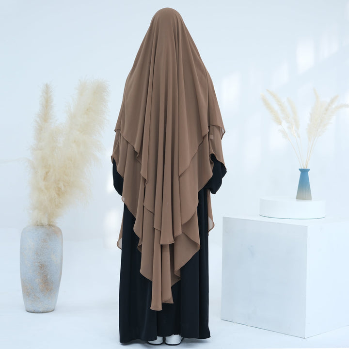 Get trendy with 2-layer Maxi Chiffon Khimar - Beige - Hijab available at Voilee NY. Grab yours for $44.90 today!