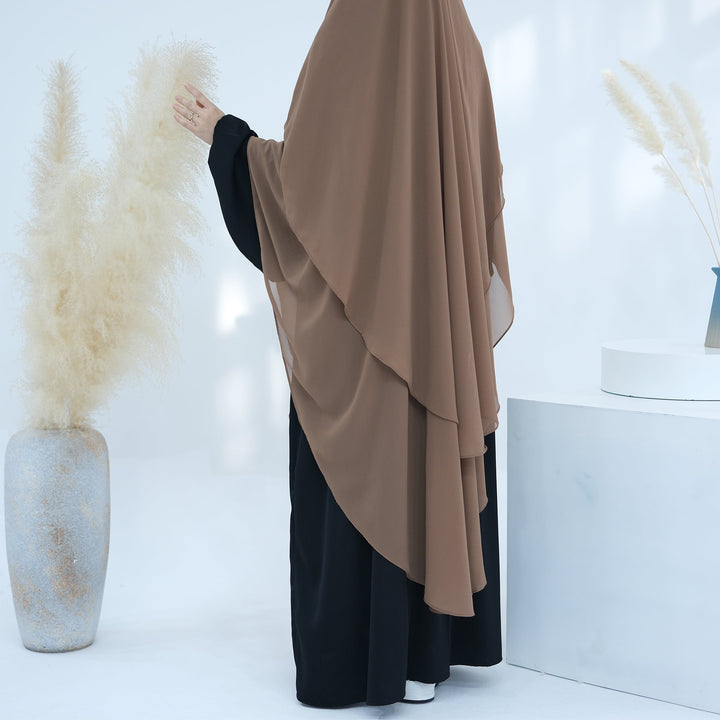 Get trendy with 2-layer Maxi Chiffon Khimar - Beige - Hijab available at Voilee NY. Grab yours for $44.90 today!