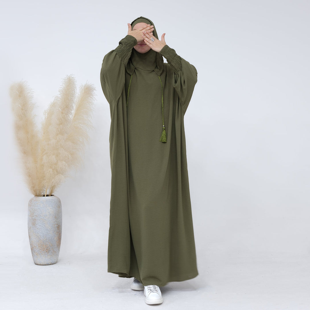 Get trendy with Rubina Double Hoodie Abaya - Olive - Dresses available at Voilee NY. Grab yours for $59.99 today!