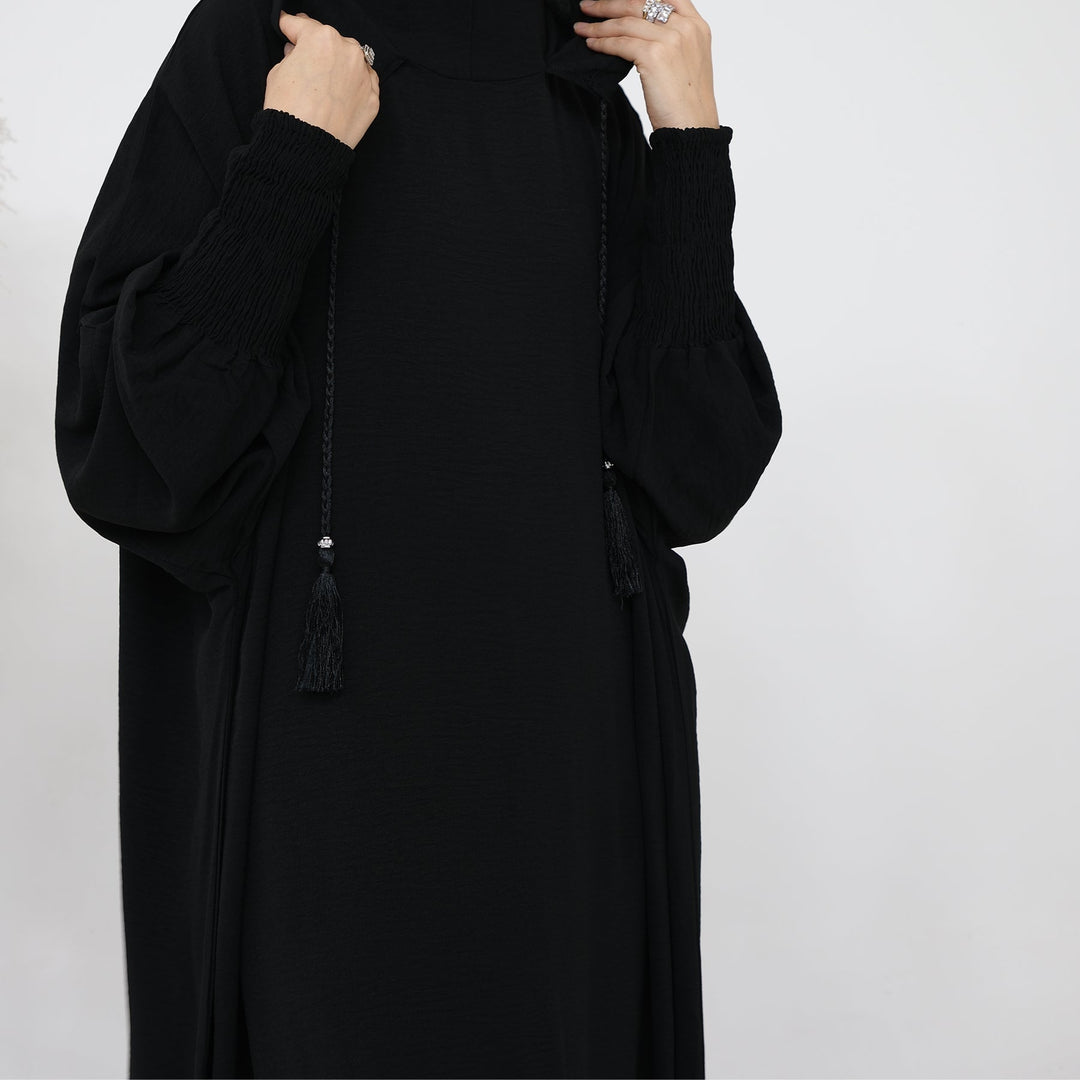 Get trendy with Rubina Double Hoodie Abaya - Black - Dresses available at Voilee NY. Grab yours for $59.99 today!