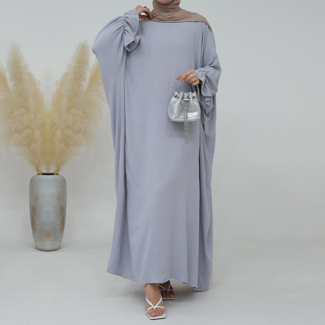 Get trendy with Dimma Bell Cuffs Abaya - Light Gray - Dresses available at Voilee NY. Grab yours for $54.90 today!