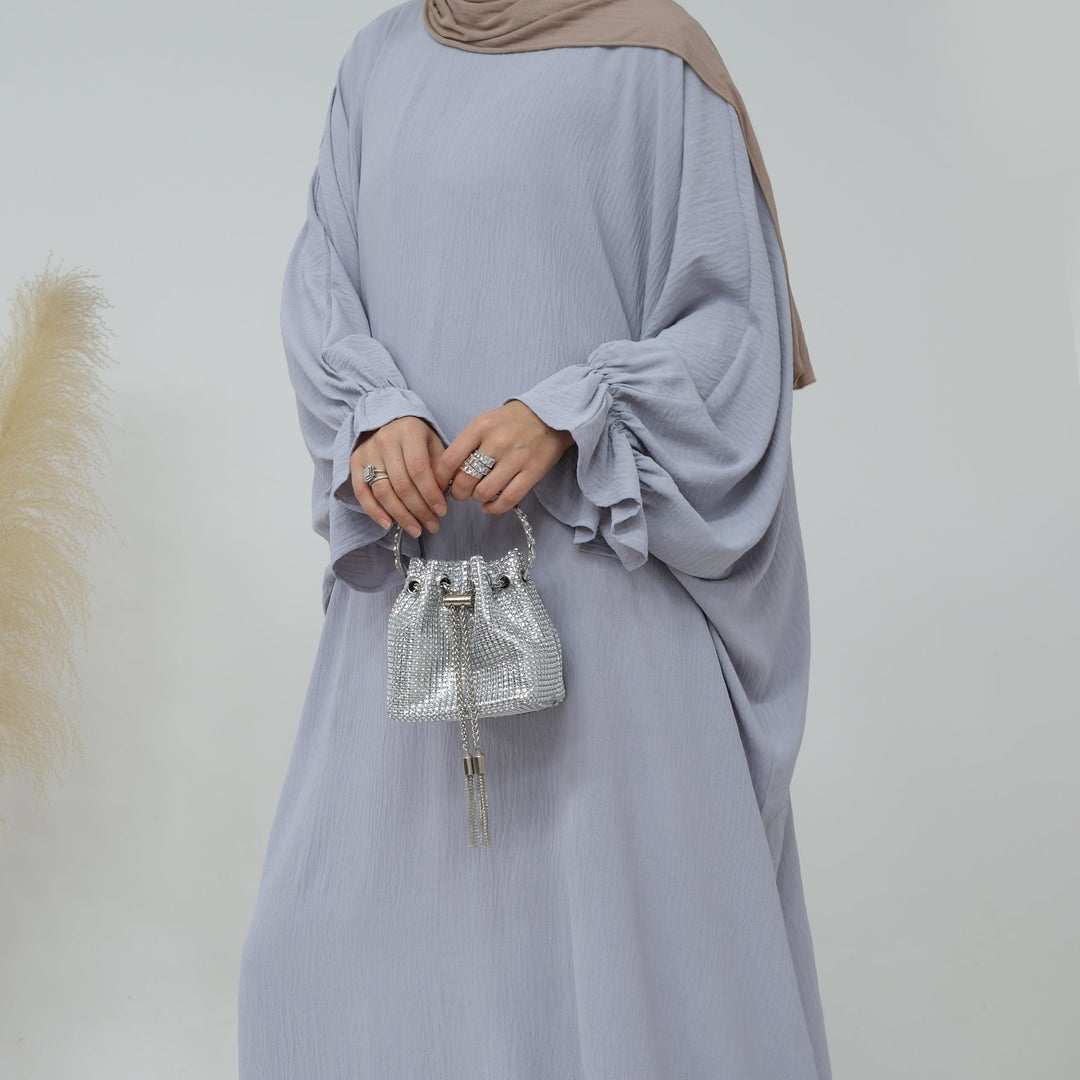 Get trendy with Dimma Bell Cuffs Abaya - Light Gray - Dresses available at Voilee NY. Grab yours for $54.90 today!