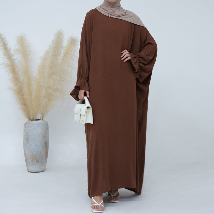 Get trendy with Dimma Bell Cuffs Abaya - Brown - Dresses available at Voilee NY. Grab yours for $54.90 today!