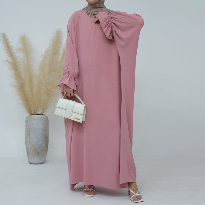 Get trendy with Dimma Bell Cuffs Abaya - Pink Coral - Dresses available at Voilee NY. Grab yours for $54.90 today!