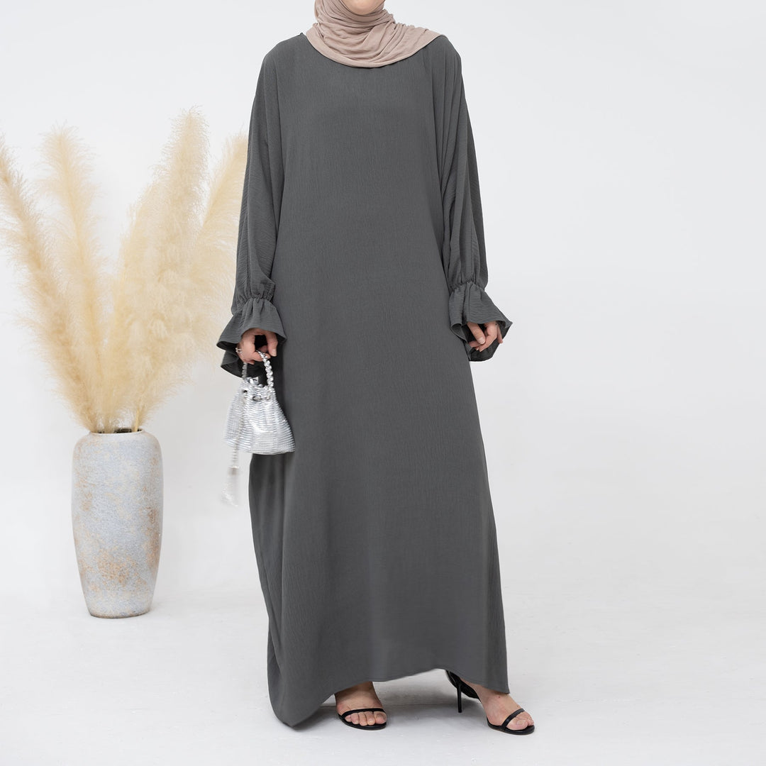 Get trendy with Dimma Bell Cuffs Abaya - Dark Gray - Dresses available at Voilee NY. Grab yours for $54.90 today!