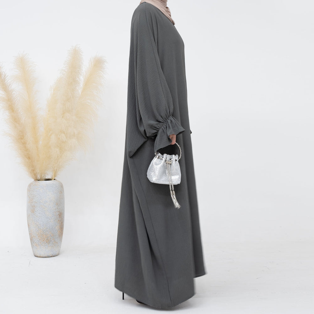 Get trendy with Dimma Bell Cuffs Abaya - Dark Gray - Dresses available at Voilee NY. Grab yours for $54.90 today!