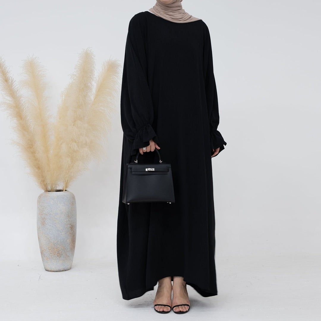 Get trendy with Dimma Bell Cuffs Abaya - Black - Dresses available at Voilee NY. Grab yours for $54.90 today!