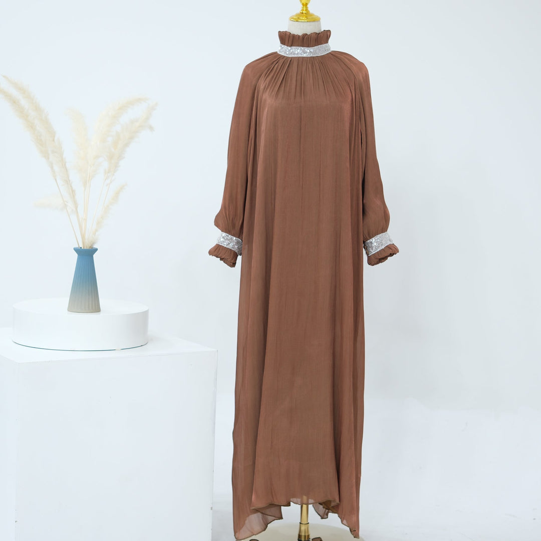 Get trendy with Safardi Maxi Dress - Coffee - Dresses available at Voilee NY. Grab yours for $69.90 today!