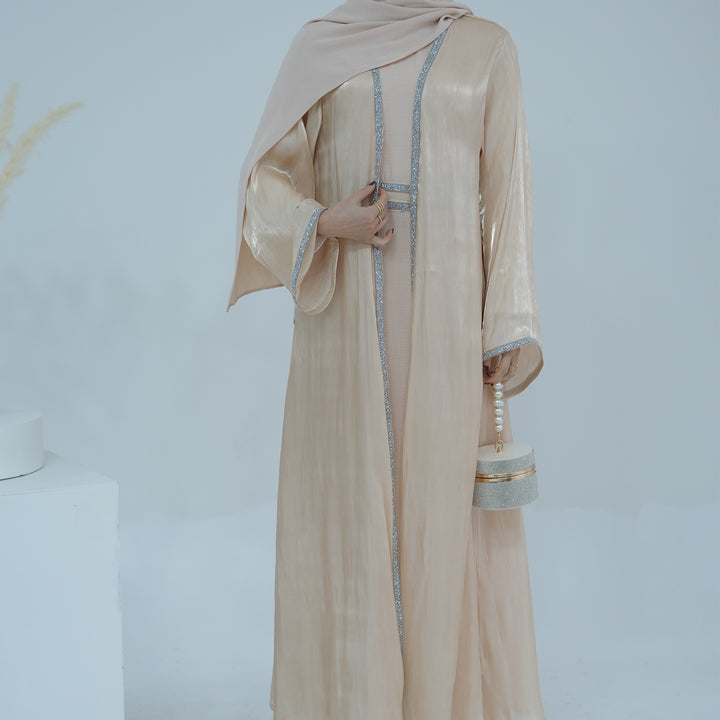 Get trendy with Siena Sequin Abaya Set - Champagne - Dresses available at Voilee NY. Grab yours for $84.90 today!