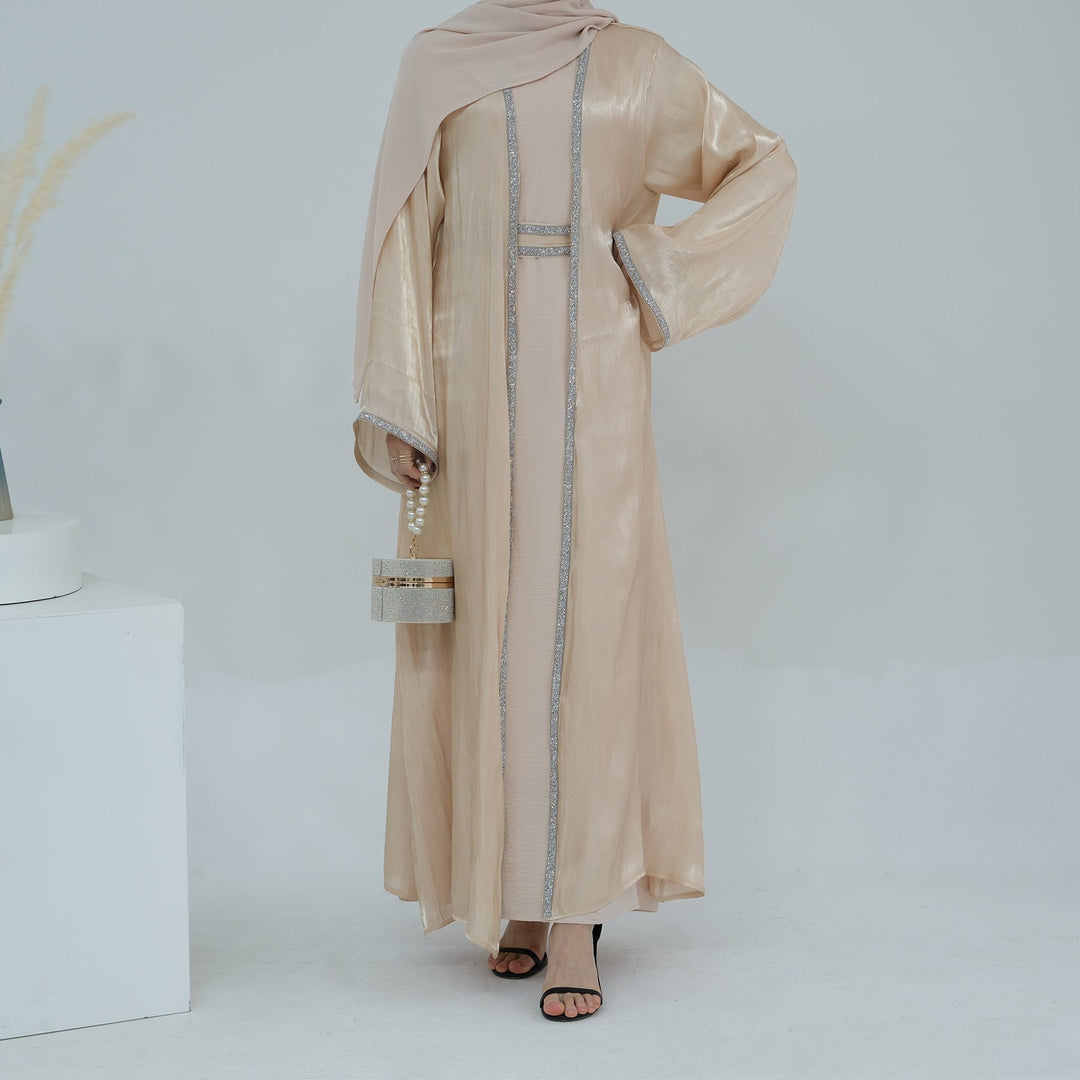 Get trendy with Siena Sequin Abaya Set - Champagne - Dresses available at Voilee NY. Grab yours for $84.90 today!