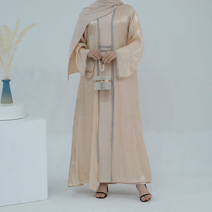 Get trendy with Siena Sequin Abaya Set - Champagne - Dresses available at Voilee NY. Grab yours for $84.90 today!