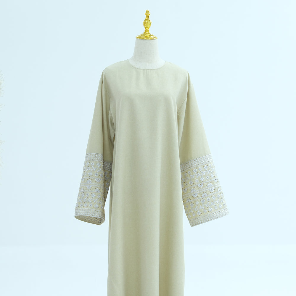 Get trendy with Josie Embroidered Abaya - Eggnog - Dresses available at Voilee NY. Grab yours for $59.90 today!