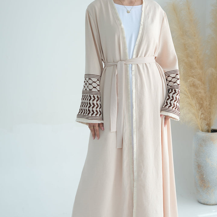 Get trendy with Kufiya Open Abaya Set - Sand - Cardigan available at Voilee NY. Grab yours for $64.90 today!