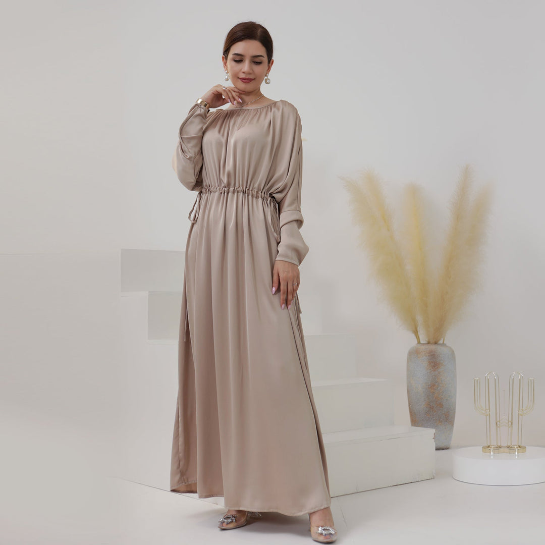 Get trendy with Kristal Satin Maxi Dress - Champagne - Dresses available at Voilee NY. Grab yours for $54.99 today!