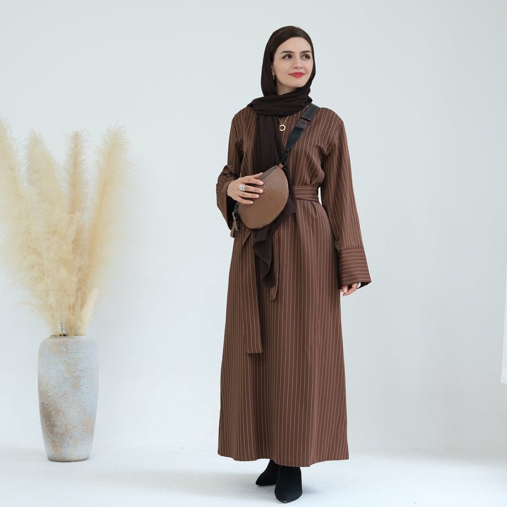 Get trendy with Janine Stripe Long Sleeve Belted Maxi Dress - Brown - Dresses available at Voilee NY. Grab yours for $44.90 today!