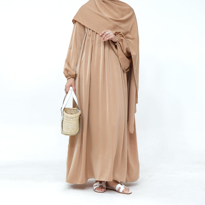 Get trendy with Amelia Satin Abaya Set - Camel - Dresses available at Voilee NY. Grab yours for $64.99 today!