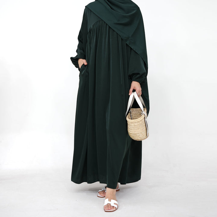Get trendy with Amelia Satin Abaya Set - Hunter - Dresses available at Voilee NY. Grab yours for $64.99 today!