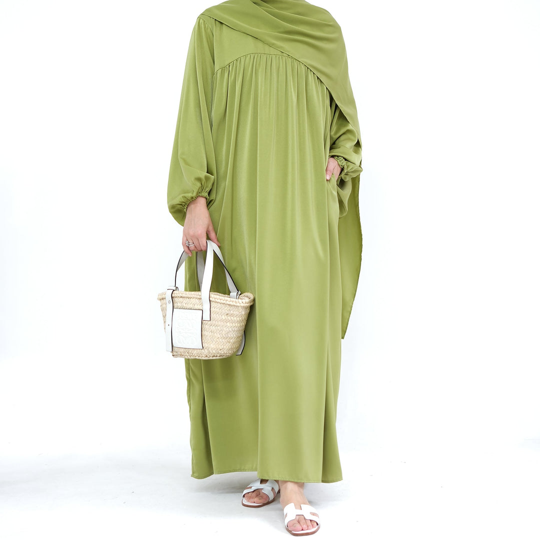 Get trendy with Amelia Satin Abaya Set - Pistachio - Dresses available at Voilee NY. Grab yours for $64.99 today!