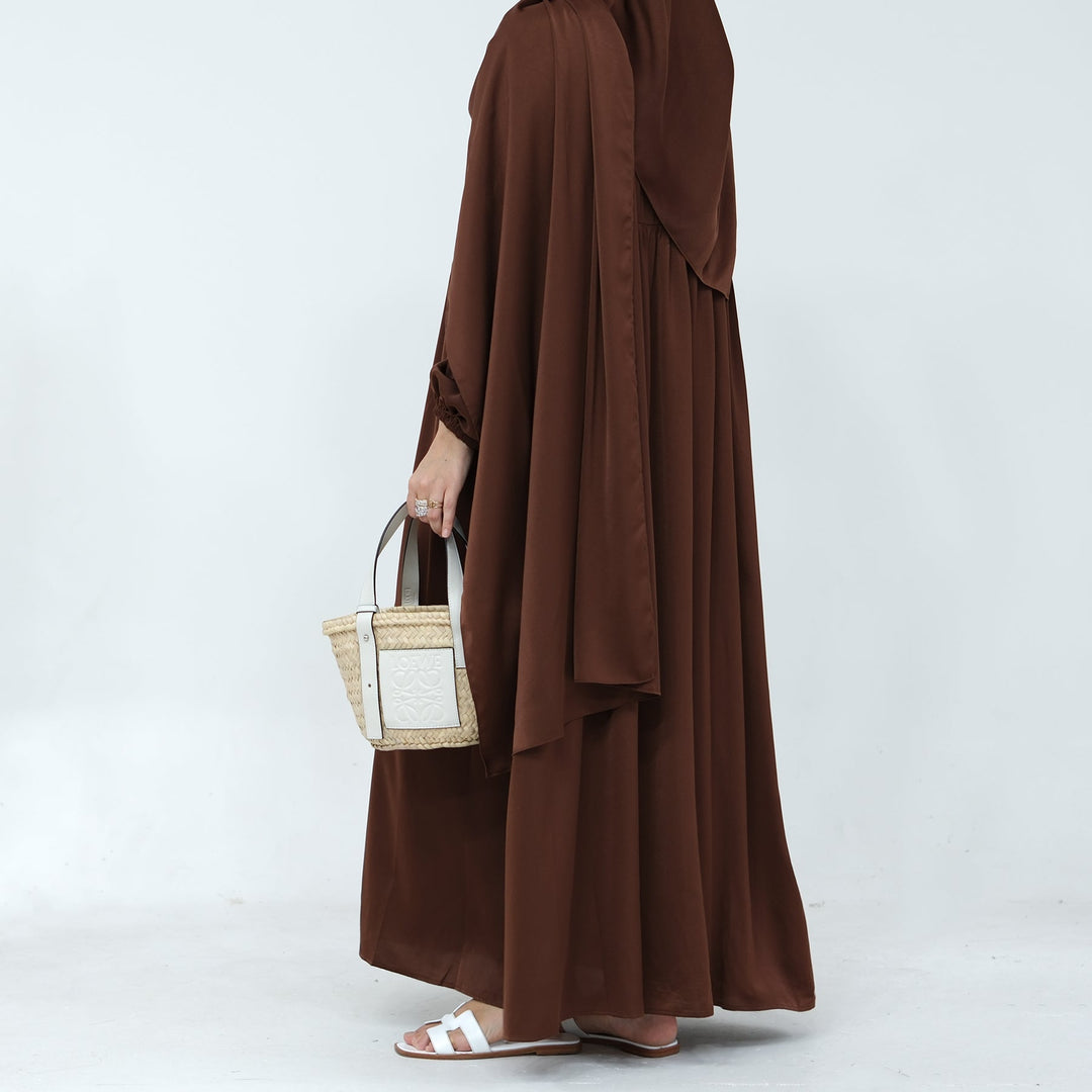 Get trendy with Amelia Satin Abaya Set - Brown - Dresses available at Voilee NY. Grab yours for $64.99 today!